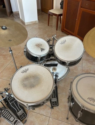 Custom gloss black millenium drum set.