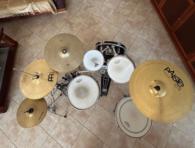 Custom gloss black millenium drum set.