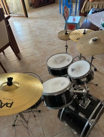 Custom gloss black millenium drum set.