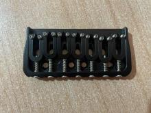 Hipshot style fixed bridge 7 string (not original)