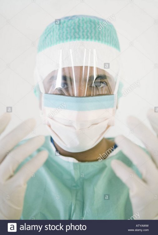 a-doctor-with-a-surgical-mask-and-latex-gloves-ATYAWW.thumb.jpg.61a7ebcc3e755041921c6a119d5a8fe1.jpg